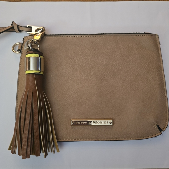 Poppy & Peonies Handbags - Poppy & Peonies clutch or wristlet-style bag. It is made of a vegan leather